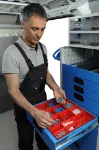 11_An drawer with modular plastic containers