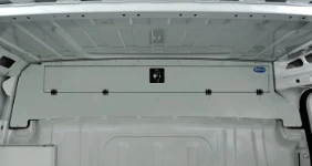 A cab roof compartment with a door