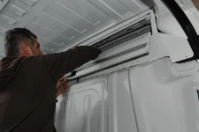 Cab roof storage for high-body vans
