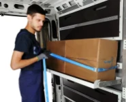 Cargo strapped in place on fold-way shelves