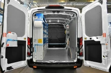 01_The PV system installer’s Ford Transit with racking on one side, liners and retaining accessories