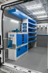 02_The workbench, two vices, drawers and shelves on the left of the Ducato