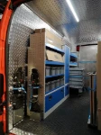 03_Shelves, a locker and plastic containers on the left of the Crafter
