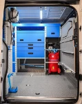 04_The compressor and stainless-steel tank for carrying jerry cans in the Interstar