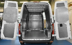 A floor liner in non-slip marble-look plywood and interior liners in aluminium chequer plate