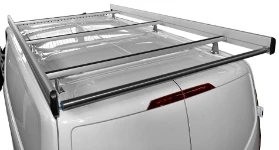 A Ford Custom with a stainless steel and aluminium roof rack