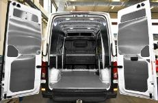 A marble-look plywood floor liner and aluminium interior liners in a TGE