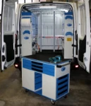 A mobile trolley in a van used by sheet metal machine technicians