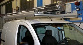 A roof rack and pipe carrier on a Fiat Fiorino