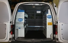 A van equipped to install and service door and gate automation