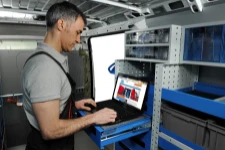 A van racking system with a computer stand