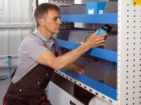 A van shelf with space dividers