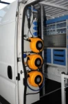 Electrical panel, three extension cord reels, electrical outlet on the Ducato
