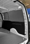 Floor and bulkhead liners in non-slip, marble-look plywood and interior liners in the Opel Combo