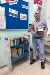01_ Luca Comunello donates books and shelves for Cassola’s bookcrossing initiative