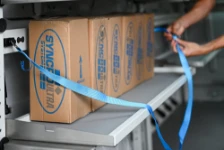 01_A close-up of a new fold-away shelf with a lashing strap for securing cargo