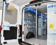 022_Cargo bars and retaining accessories on the left of the Transit