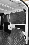 03_ Aluminium tread plate door and wall liners in the Fiat Doblò