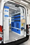 03_Syncro’s pull-out vice bench and transparent containers on the right of the first Ford Transit