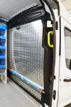 04_Chequer plate aluminium liners and Syncroblock bar on the Transit’s bulkhead 
