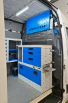 05_The Sprinter’s bulkhead with another work surface, a pull-out vice bench and tool rack panel