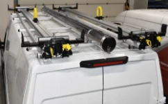 05_Two ladder slides and a pipe carrier on the roof of the Daily L3H2