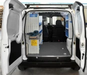 A Fiorino with shelves and transparent containers