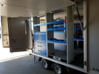 A mobile workshop for a trailer or container