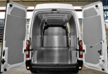 A plywood floor liner and steel bodywork liners in a Movano