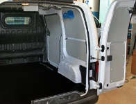 A plywood floor liner and steel bodywork liners in the NV200