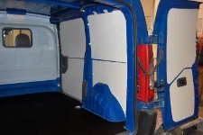 A plywood floor liner and steel sheet interior liners in the Scudo