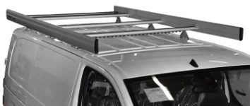 A roof rack with rear roller and side fences on a 2019 Vivaro