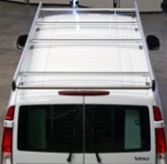 A roof rack with rear roller and side fences on a Vito