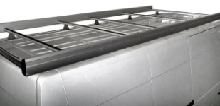 A roof rack with side fences and a rear loading roller on the Master