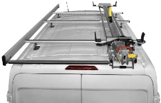 A single ladder slide on a roof rack with rear roller and side fence