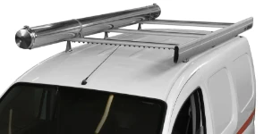 A stainless-steel pipe carrier on the roof of a Kangoo