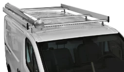 A steel pipe carrier on the roof of a Renault Trafic 