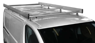 An aluminium and steel roof rack on an NV300