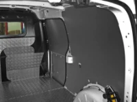 An aluminium tread plate floor liner and steel bodywork liners in the Kangoo