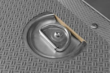 An anchor ring cup recessed in the floor liner