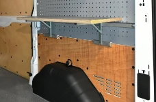 An open fold-away table in a van