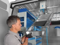 An under-roof ladder rack in use