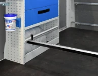 Cargo bars fixed to the racking
