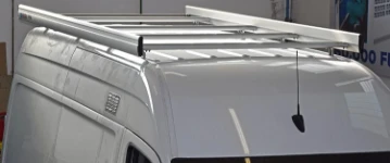 Roof rack with loading roller and side fences on the Sprinter