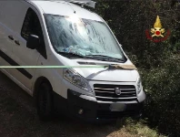 Ropes attached to the van at various points