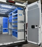 Shelves, plastic containers and cargo retaining accessories on the right of the Boxer