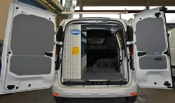 Shelving on the left of the Dokker