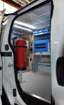 The Bipper’s racking system and fire extinguisher seen through the side door