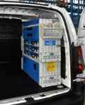 The right of the Berlingo showing the case trays, spray can rack and silicone cartridge rack