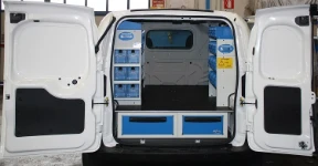 Underfloor drawers in a Syncro van upfit for a boiler technician